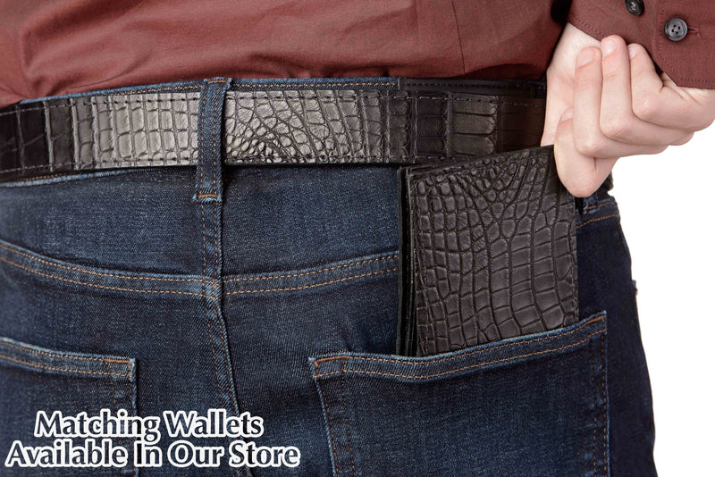 Man holding black leather wallet and wear single stitched alligator leather belt by Bullhide Belts